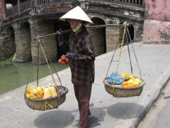 39-Vietnamese woman with merchandise